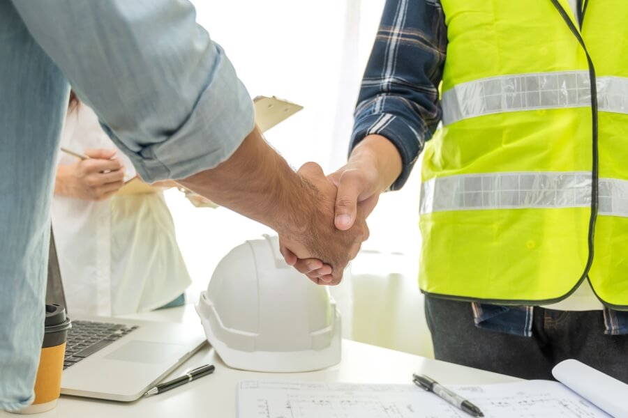 Shaking Hands to Seal Deal of Equipment Sale